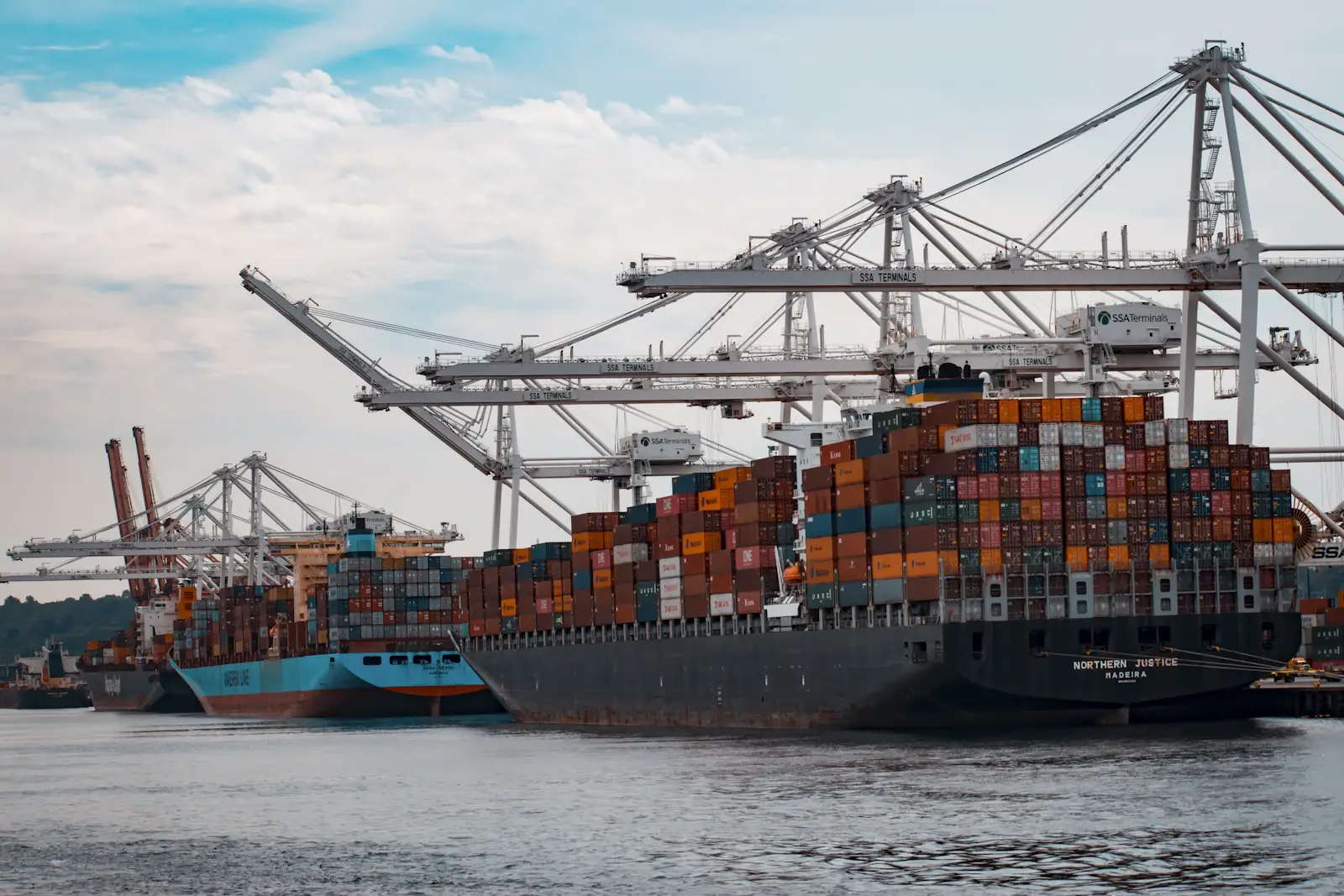 Container ship carrying cargo across the sea